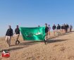 اهتزاز پرچم امام حسین(ع) توسط بسیجیان پیرانشهر در ارتفاعات میاندوآب